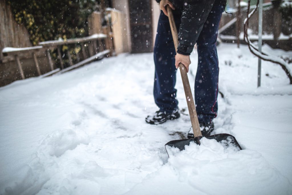 Tips for Safe Snow Shoveling - LANDMARK EXTERIORS