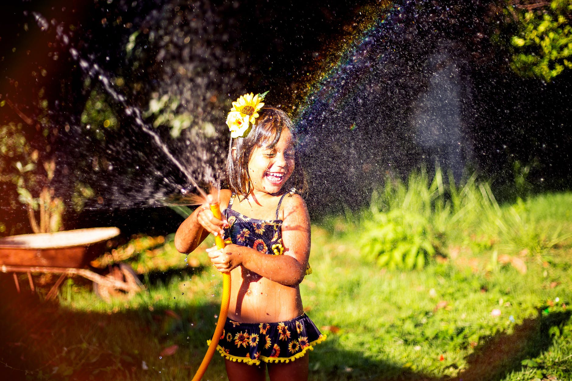 young girl enjoying the outside yard