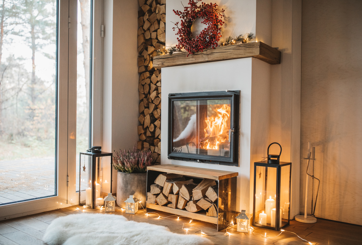 Cozy living room winter interior with fireplace