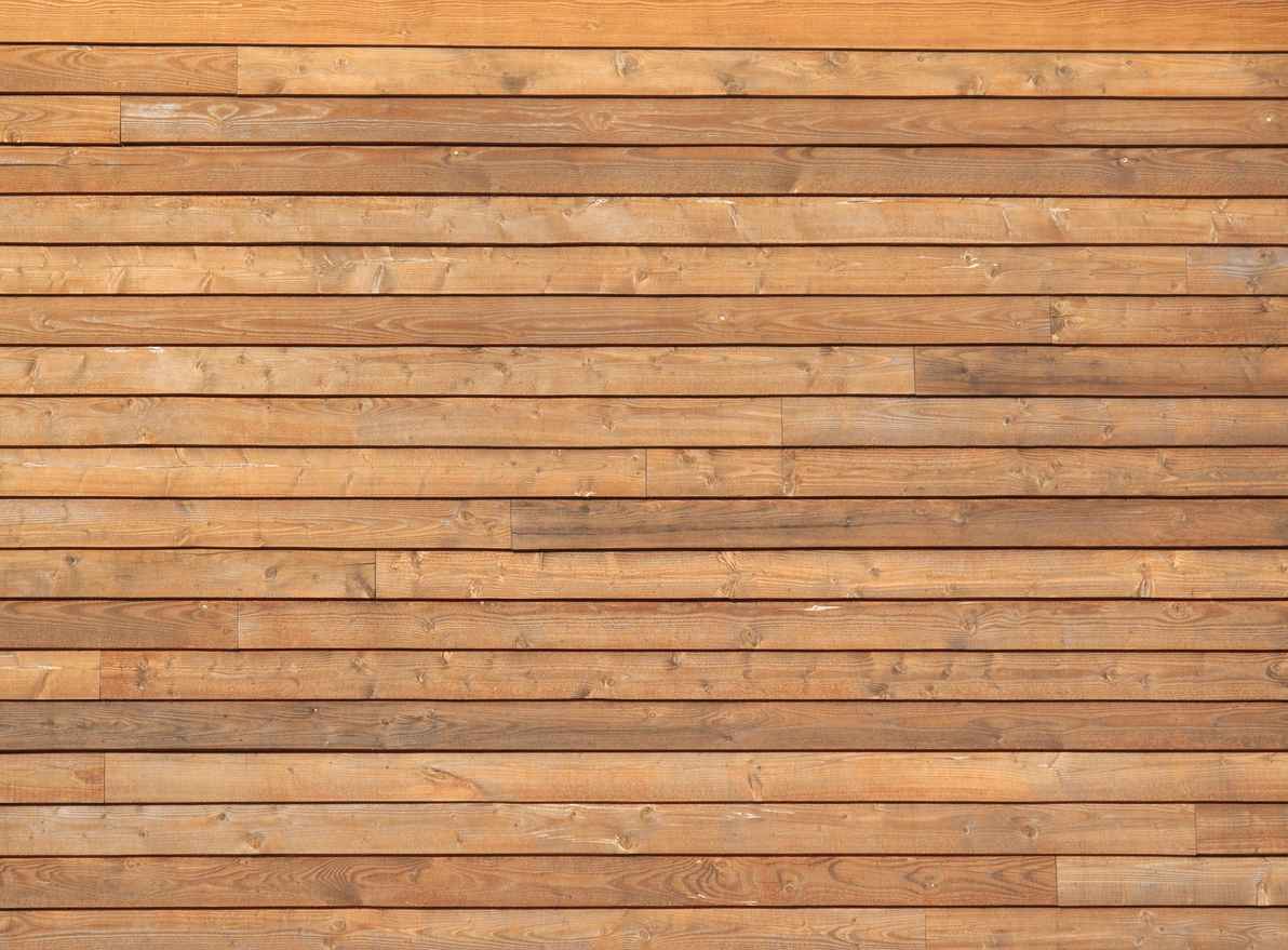 Cedar siding on building exterior, protecting your siding from weather dmaage