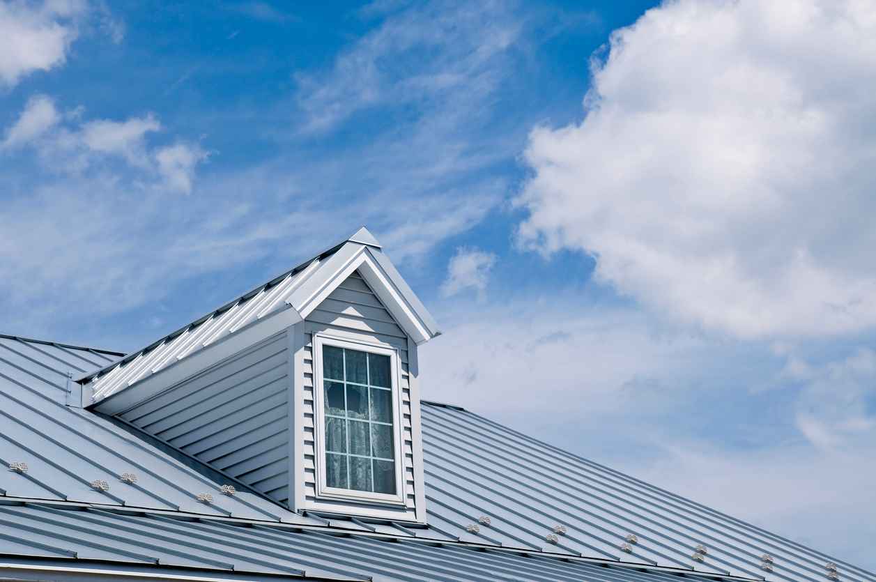A nicely decorated metal roof top in traditional style
